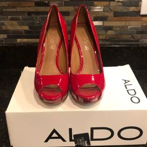 Red Aldo pumps